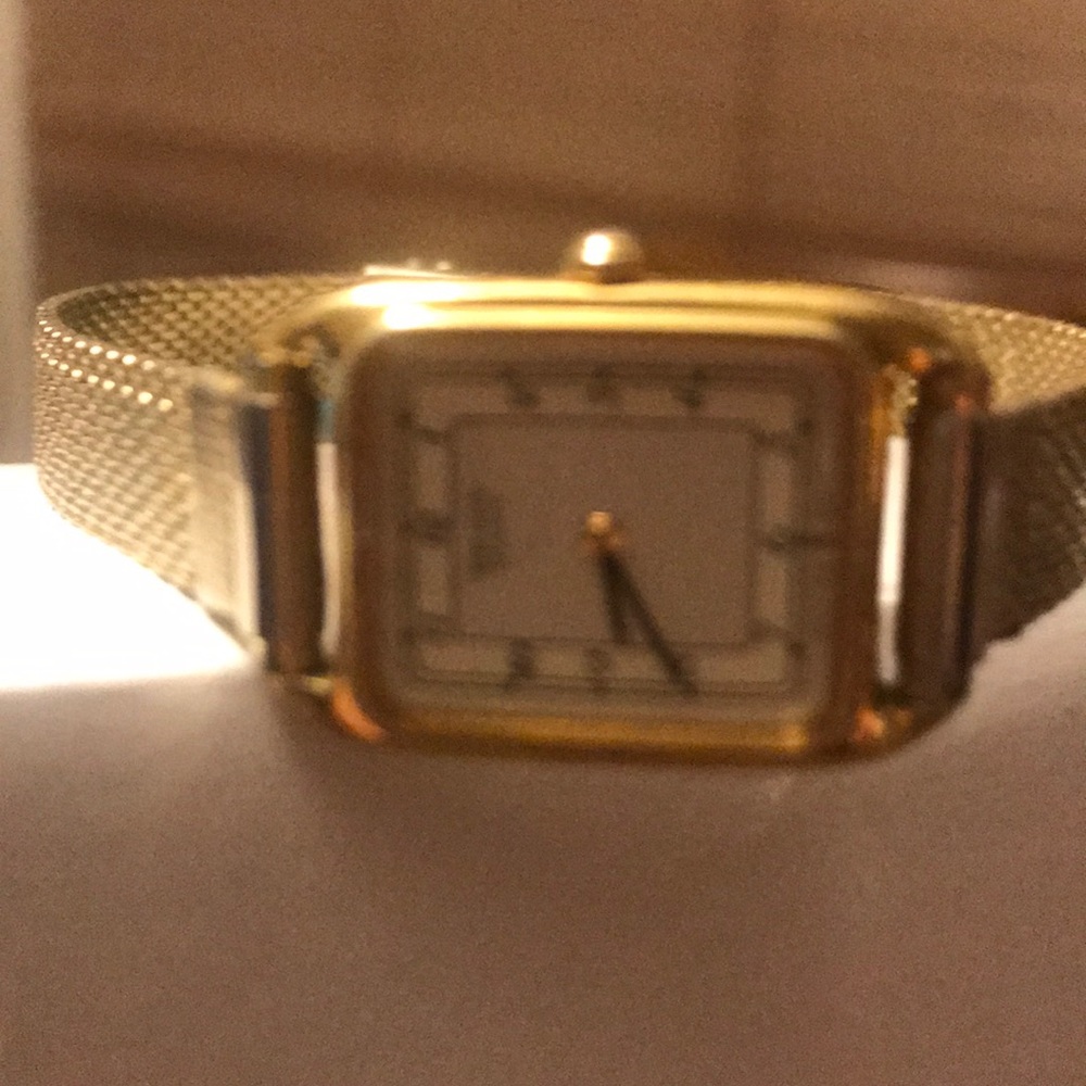 Gold banded watch